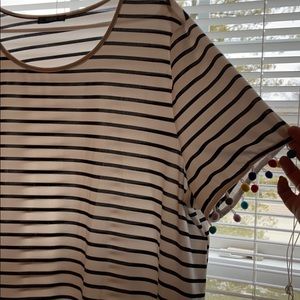 Striped dress with pompoms